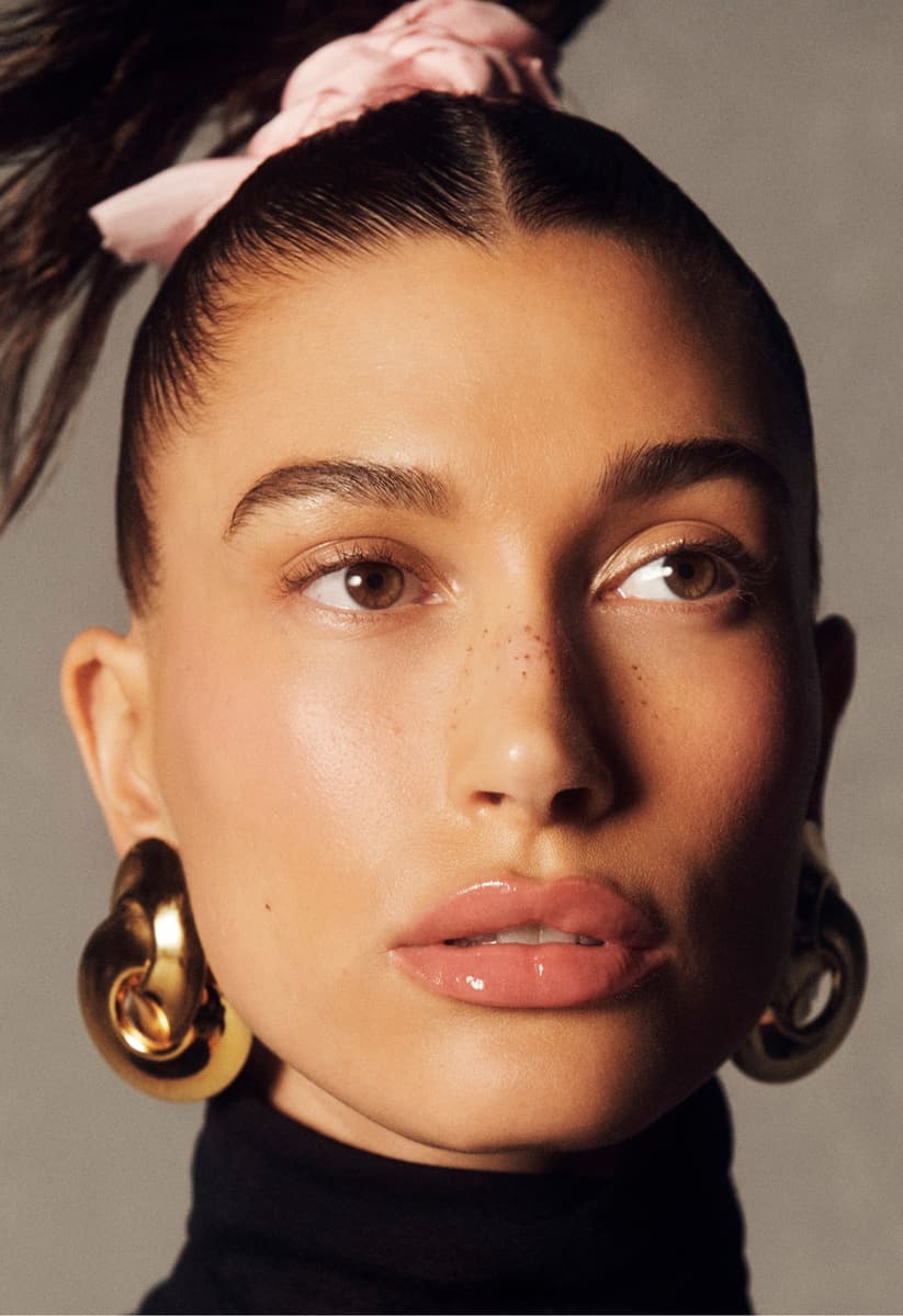 Hailey Bieber wearing ribbon lip tint on lips